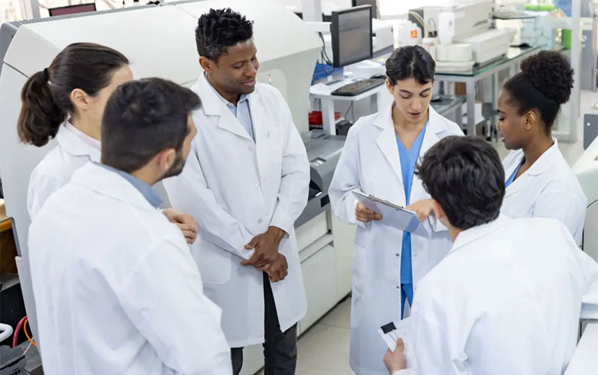 skilled scientists meeting in a lab